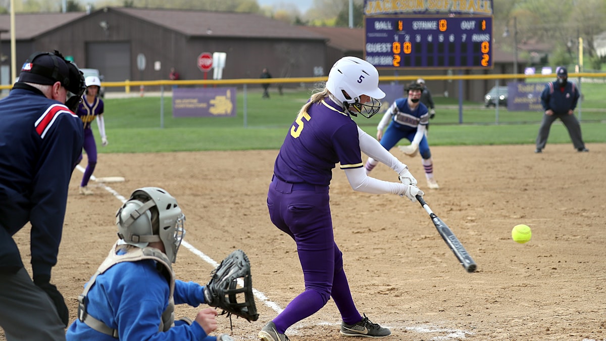Softball pitcher delivering a pitch NiJaree Canady 1000th strikeout story
