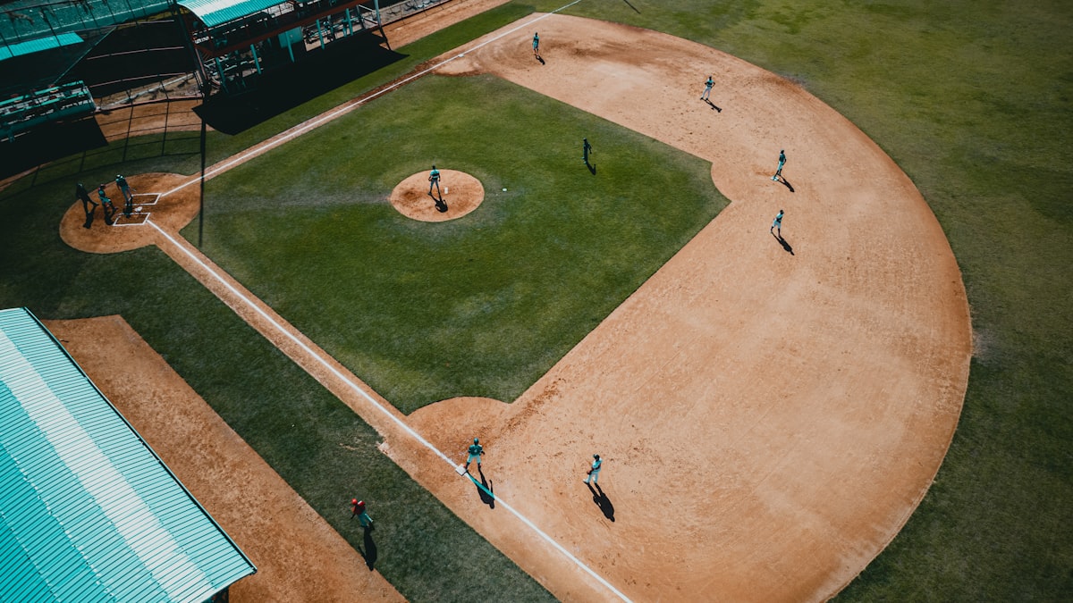 Softball batting practice at stadium MLB investment in AUSL