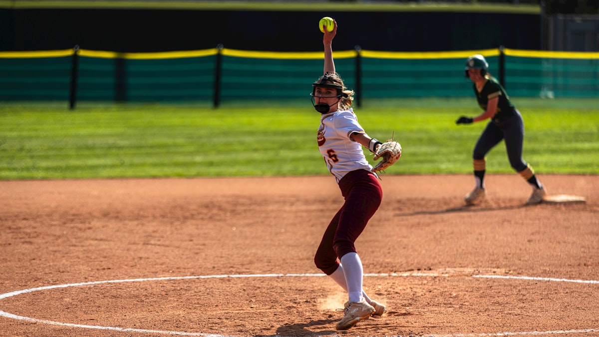 Professional softball game action Emma Lemley Carolina Blaze
