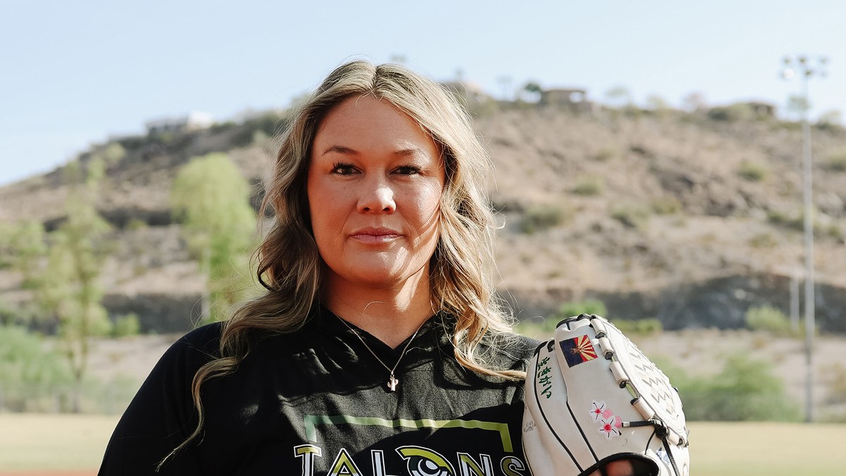 Dallas Escobedo in a Utah Talons shirt holding her glove
