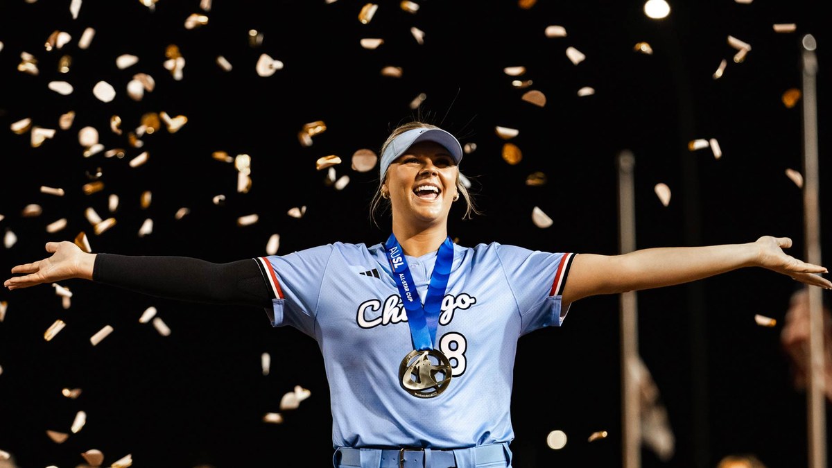 Chicago Bandits pitcher Lexi Kilfoyl celebrates with the All-Star Cup medal as confetti falls