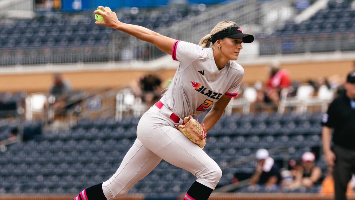 Karlyn Pickens pitches for the Carolina Blaze in a white road uniform